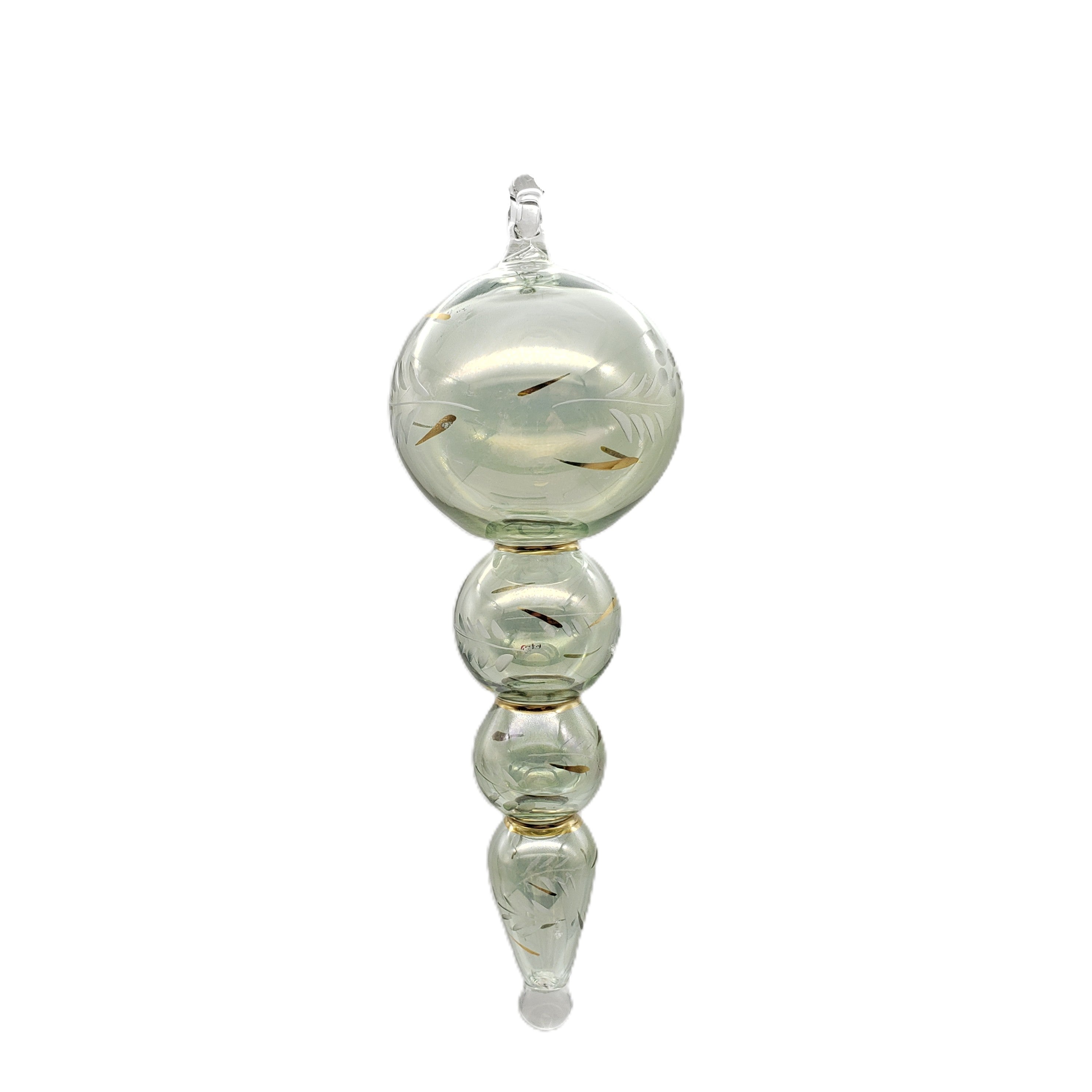 A handblown green glass Christmas ornament with multiple bubbles, etched and painted details, and a gold satin ribbon at the top.