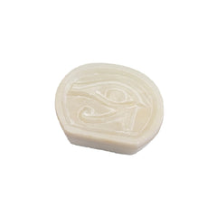 White soapstone box with an eye symbol on a white background