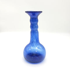 Blue glass vase on a white background