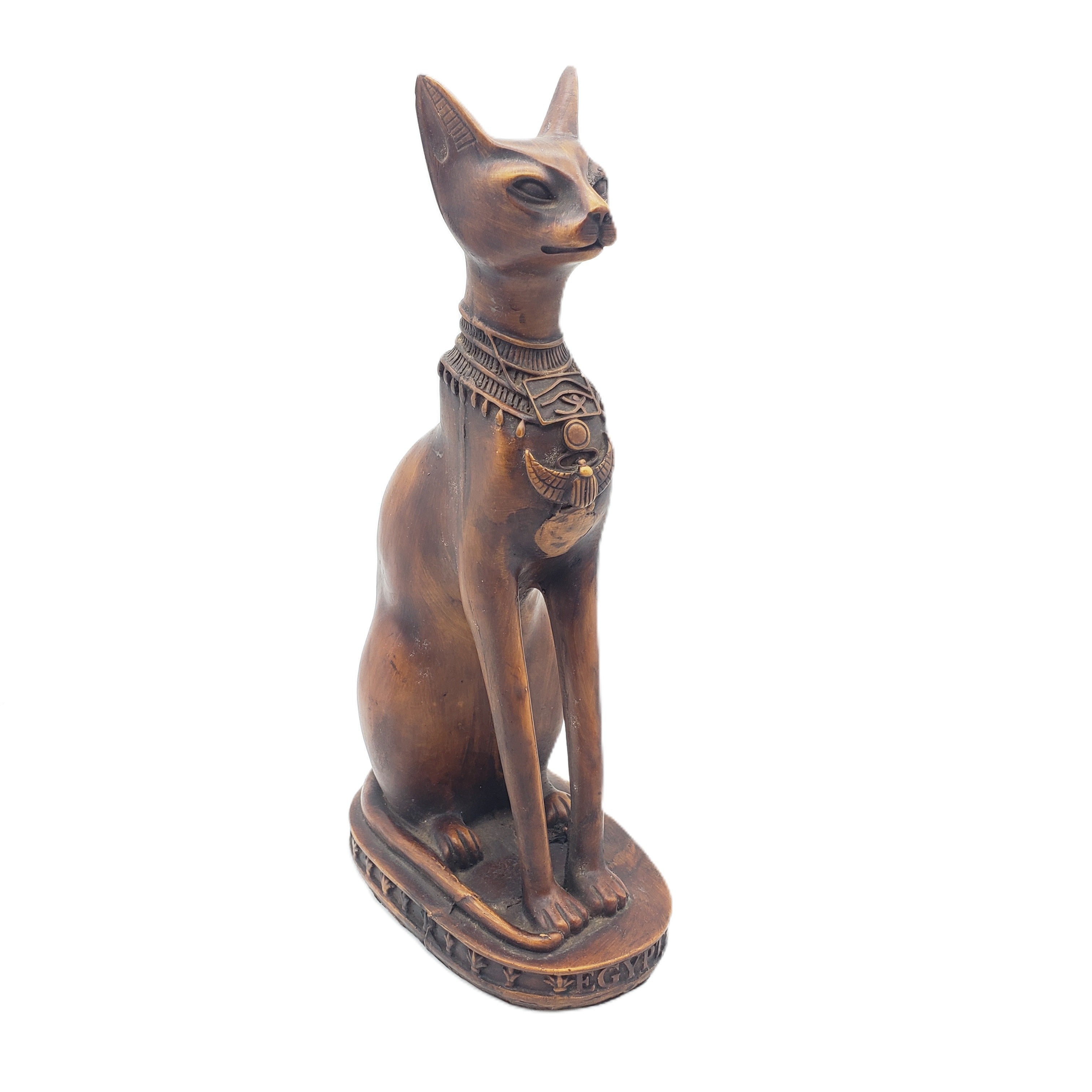 Brown statue of an Egyptian cat god on a white background