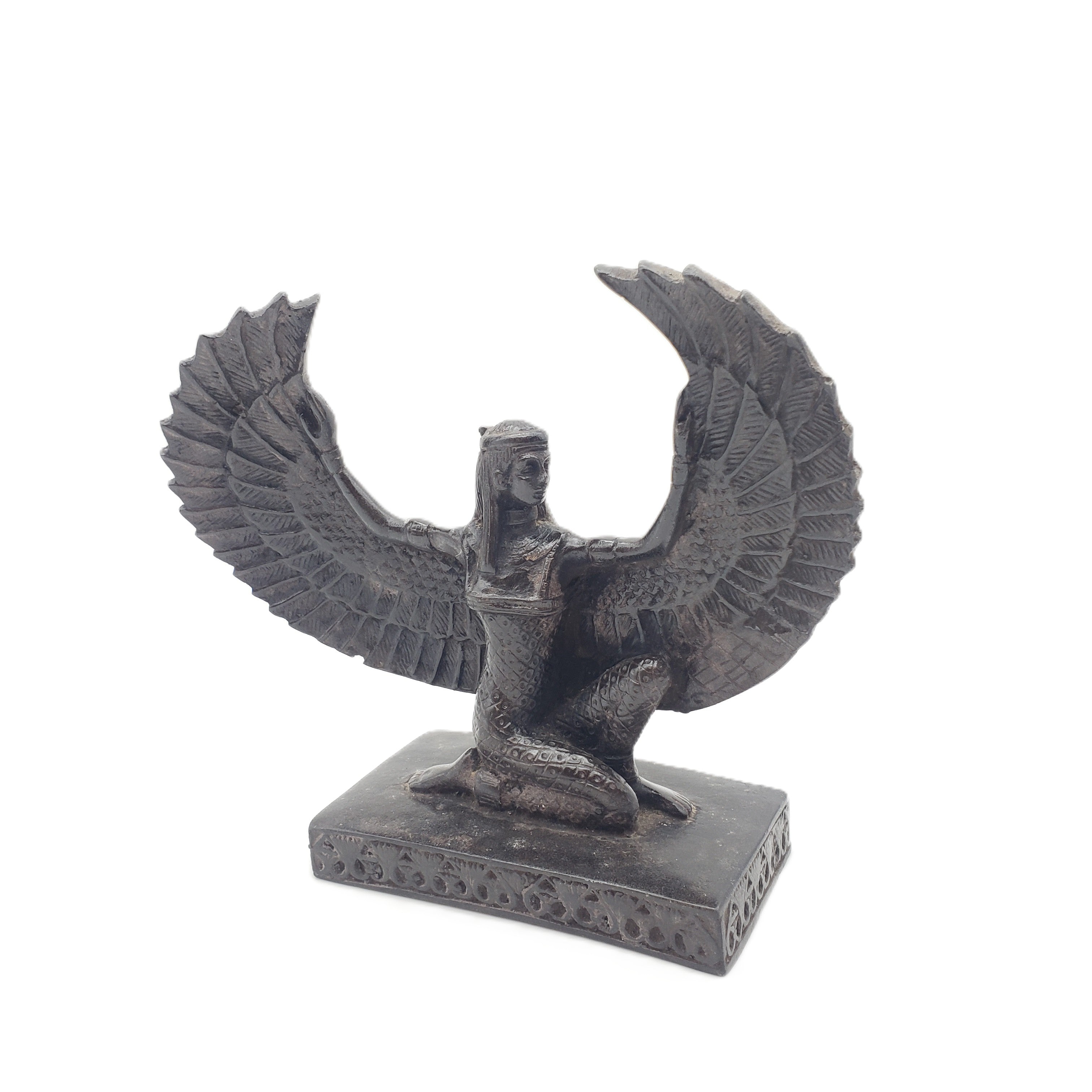 Statue of a winged creature on a white background
