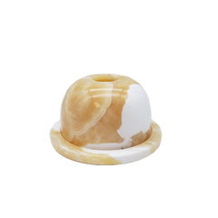 Decorative candle holder with marble pattern on a white background