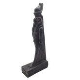 Black statue of Egyptian god Ra with hieroglyphics on a white background