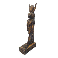 Decorative statue with intricate designs on a white background