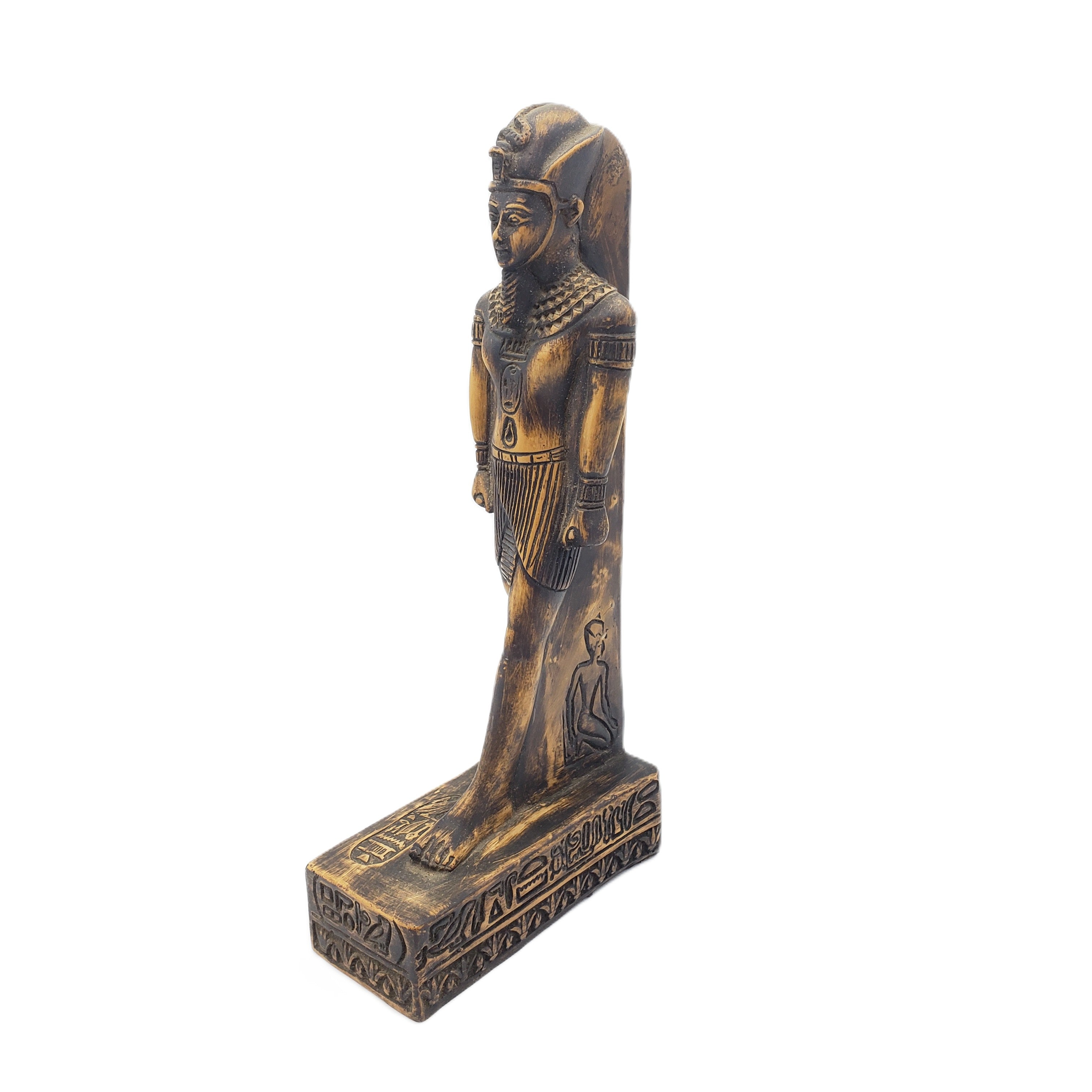 Bronze-colored Egyptian-style statue of King Amunhotep on a white background