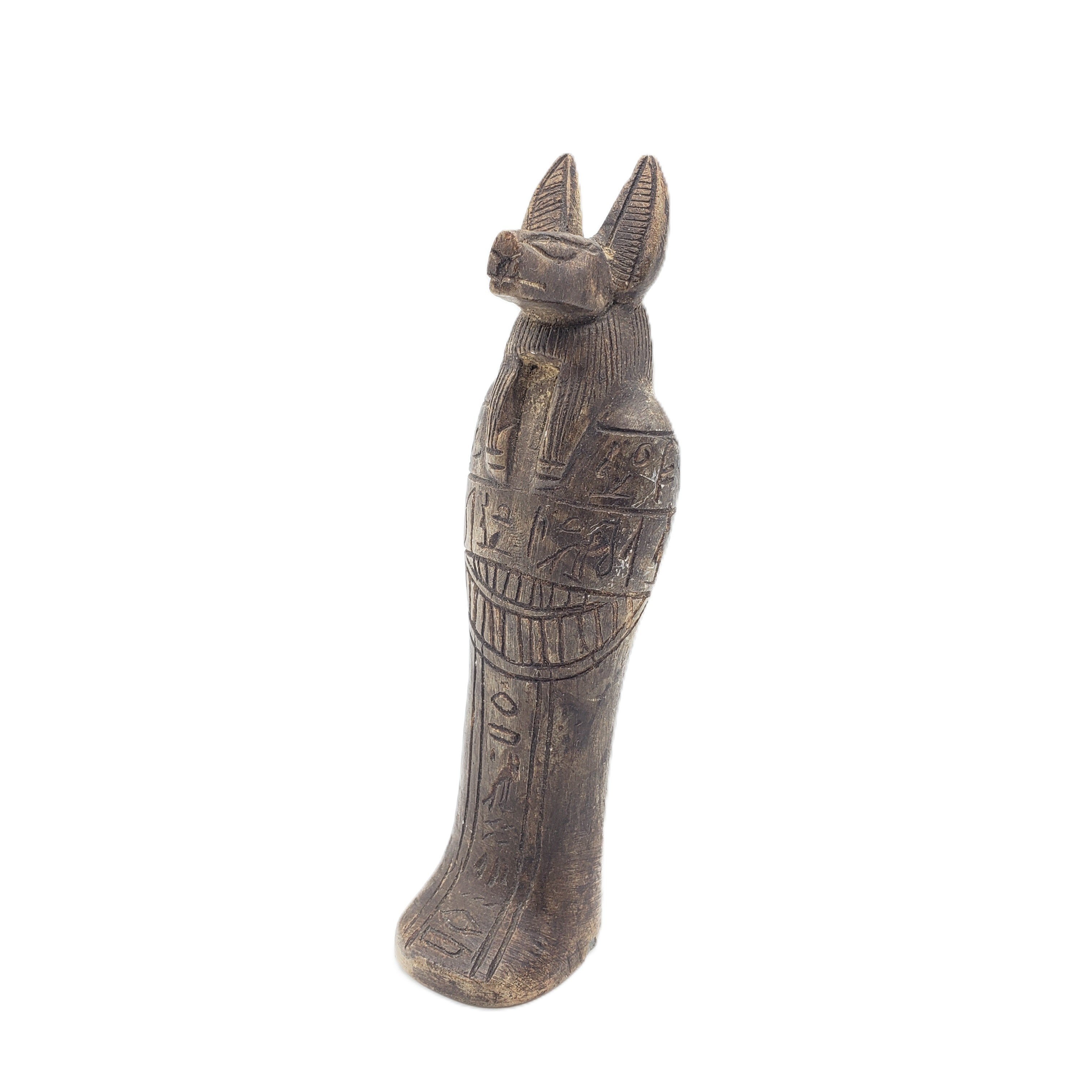 Egyptian god Anubis statue on a white background