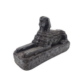 Statue of a sphinx on a white background