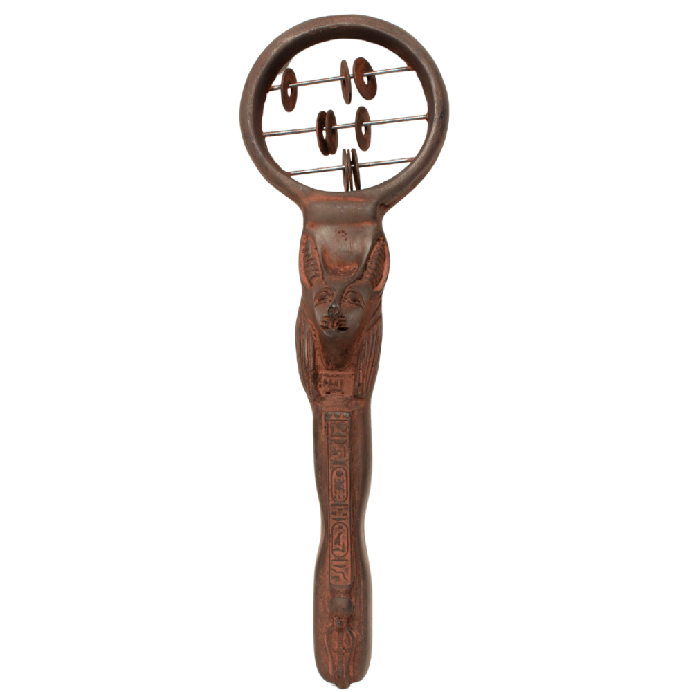 An ornate, hand-carved Egyptian-themed object, a decorative ceremonial tool, featuring a detailed Anubis figure and hieroglyphic engravings on a solid white background.