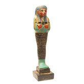 Decorative Egyptian-style figurine on a white background