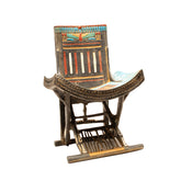 Decorative chair with colorful backrest on a white background