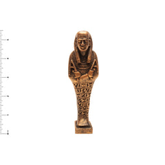 Bronze-colored Egyptian-style statuette on a white background with a ruler for scale.