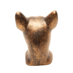 Bronze sculpture of a cat's head on a white background
