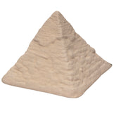A small pyramid-shaped decorative object with a textured, sandy beige surface, shown on a plain white background.
