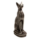 Statue of a cat with a traditional collar on a white background