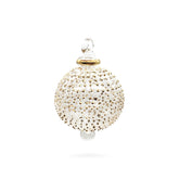 Decorative ornament with gold embellishments on a white background