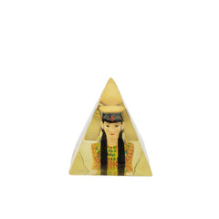 Triangular statue with an Egyptian-themed design on a white background
