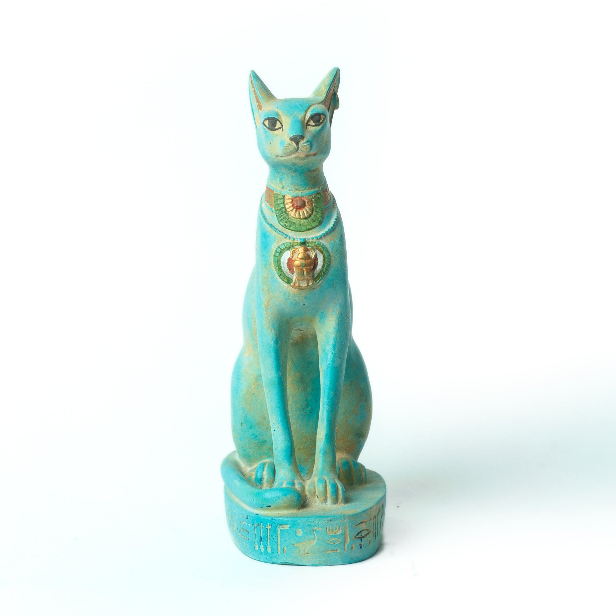 Turquoise cat figurine with gold accents on a white background