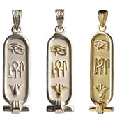 Three cartouche pendants with hieroglyphic symbols for 'Health, Life, & Happiness', featuring the Eye of Horus, a middle symbol, and a lotus flower at the bottom, in varying metal colors.