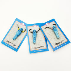 Three blue mummy-shaped amulets on cards with 'Mummy' text on a white background
