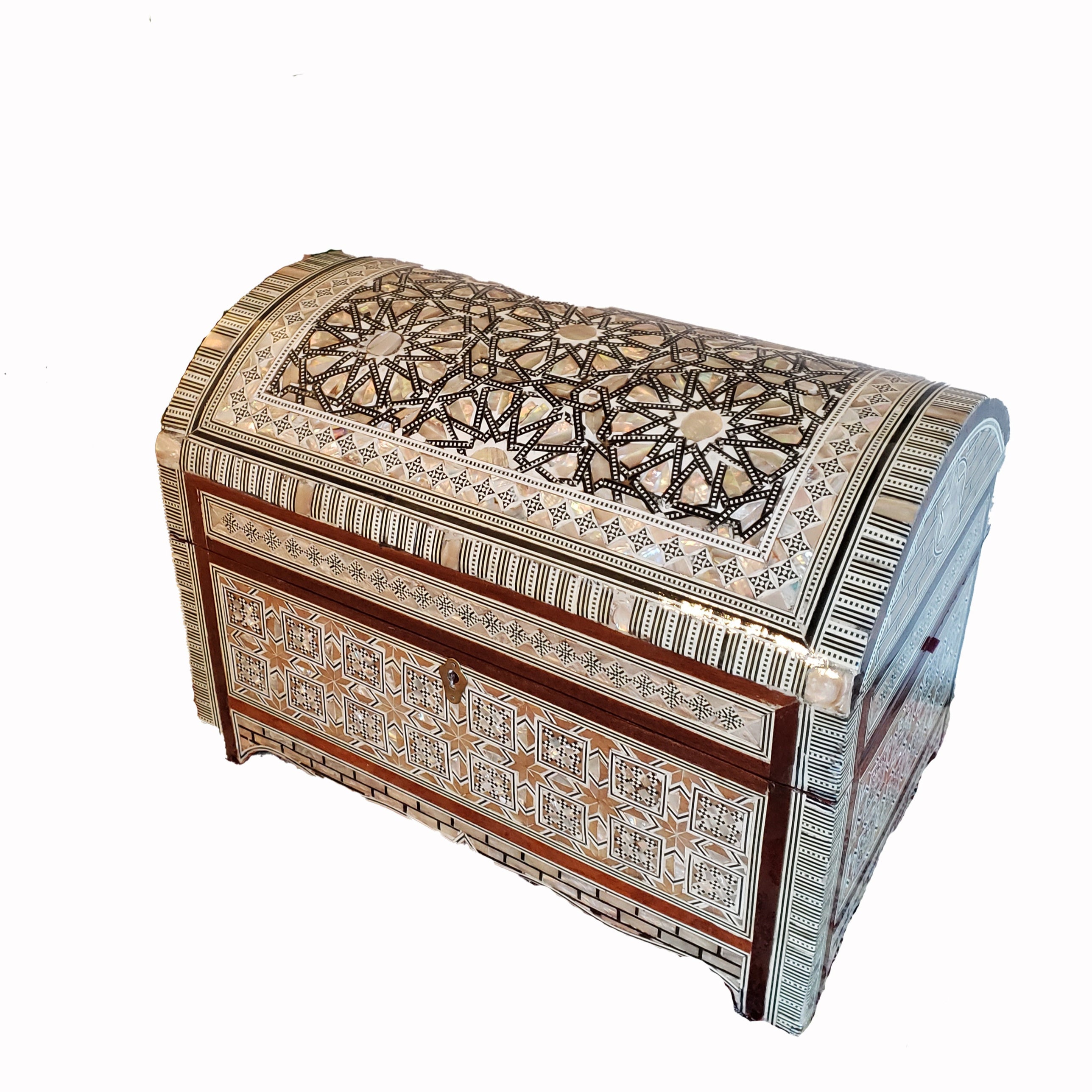 Decorative wooden box with intricate patterns on a white background