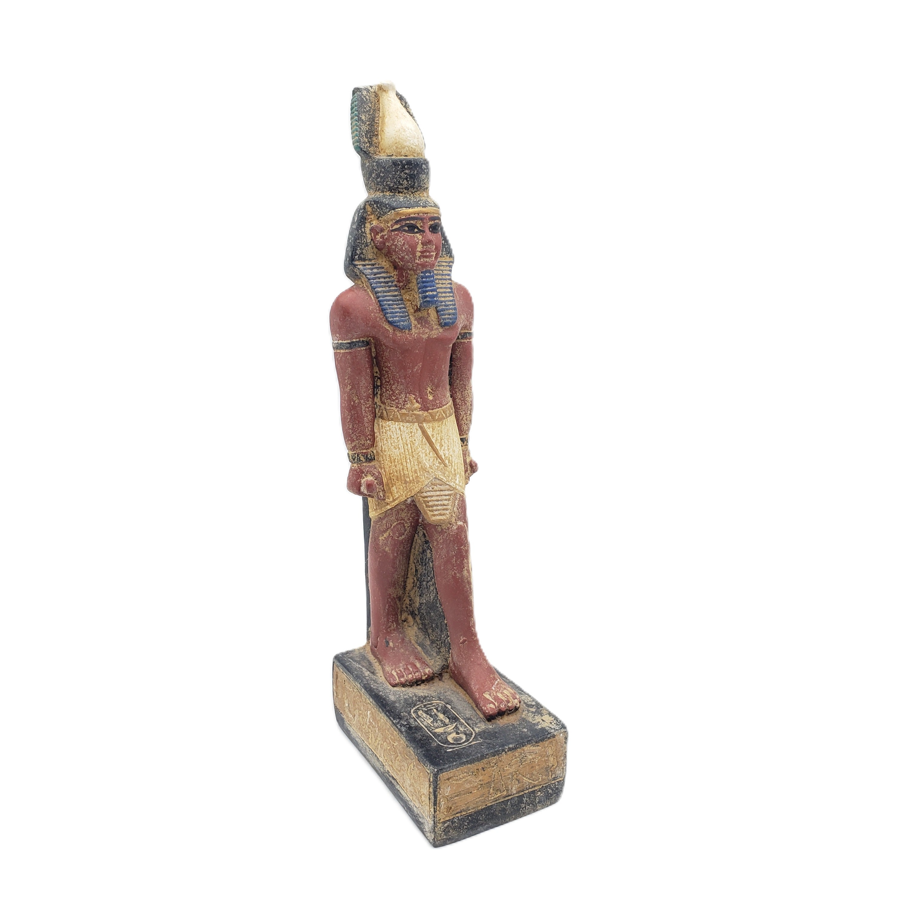 Decorative statue of an Egyptian pharaoh on a white background