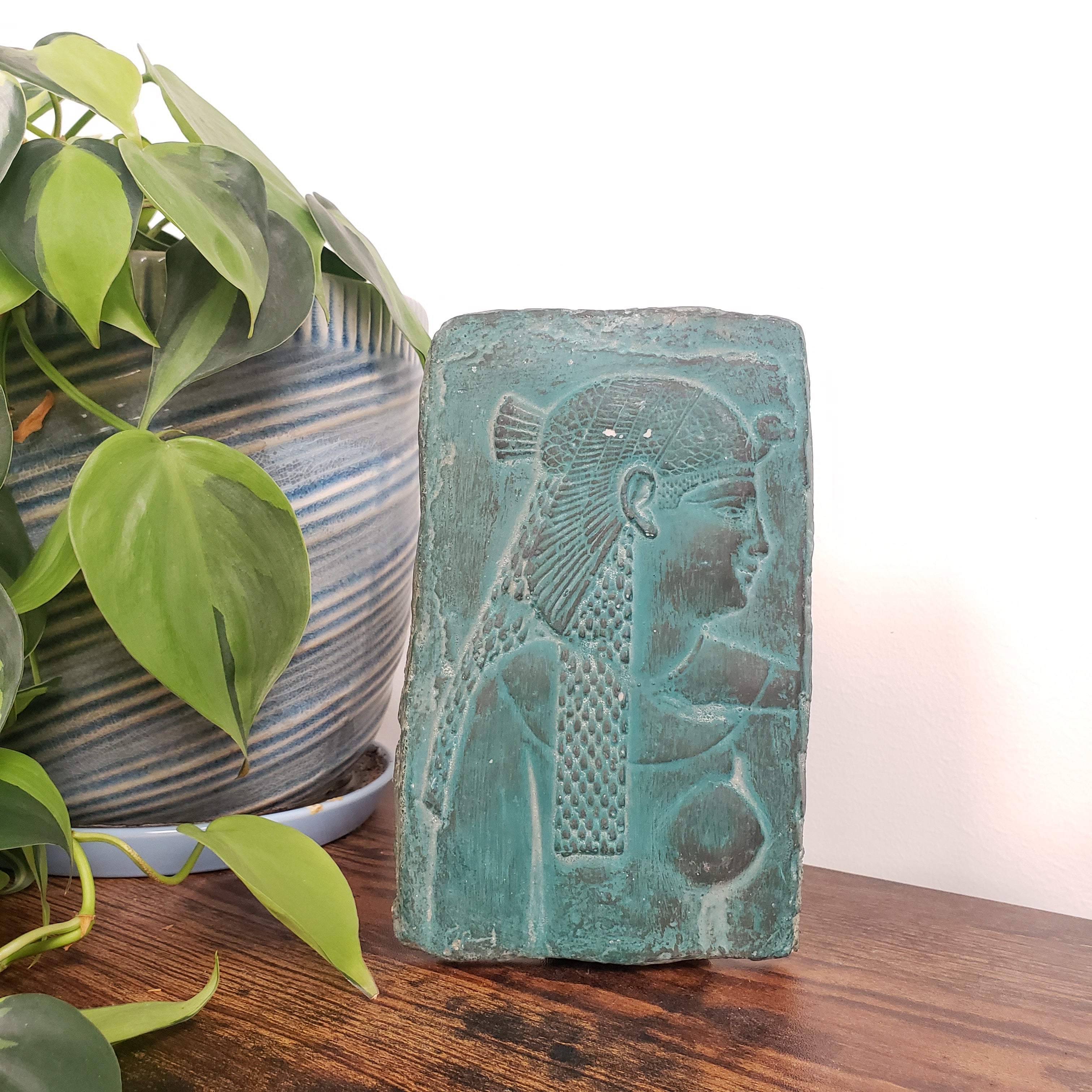 Decorative Cleopatra wall hanging on a white background