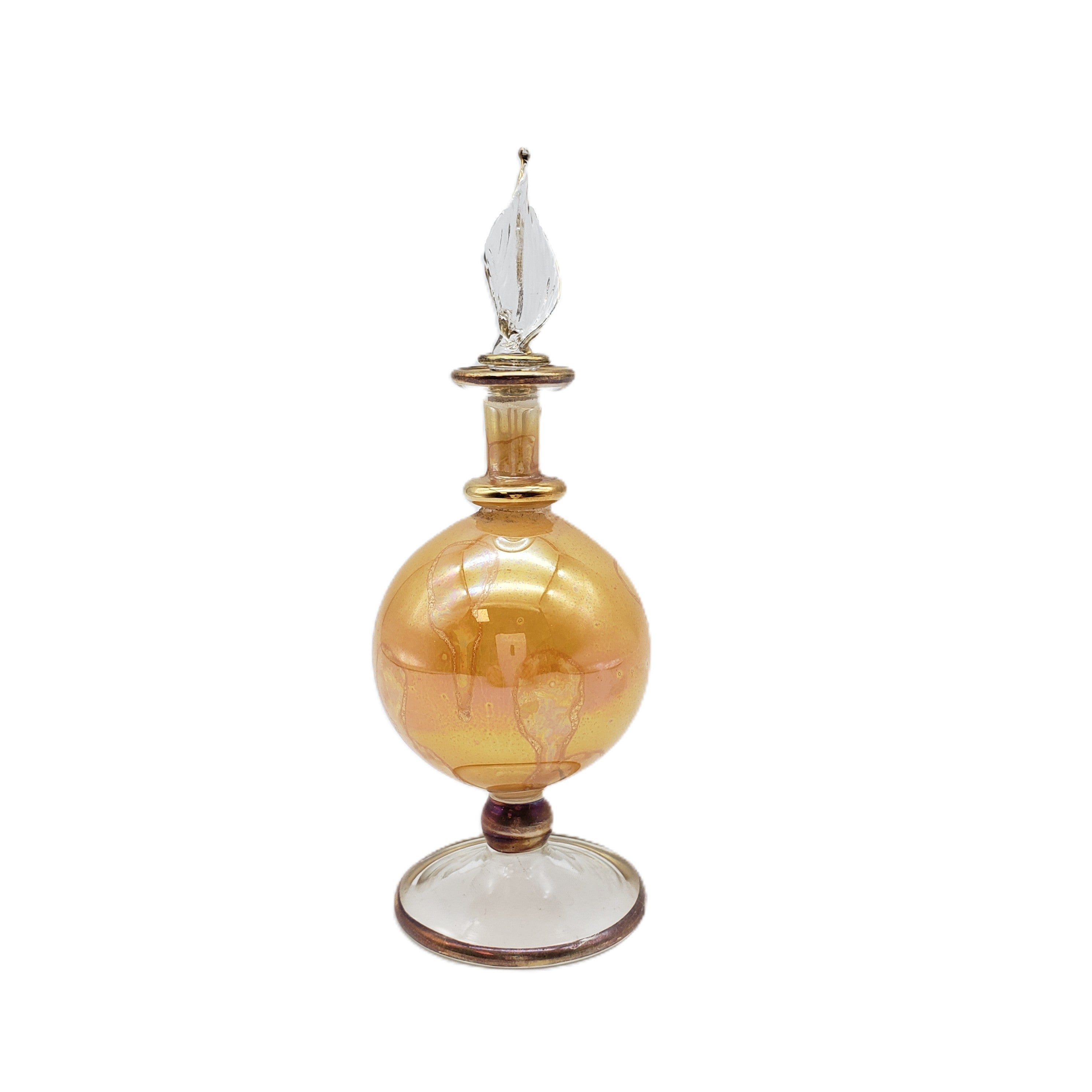 Decorative glass bottle with a gold and clear design on a white background