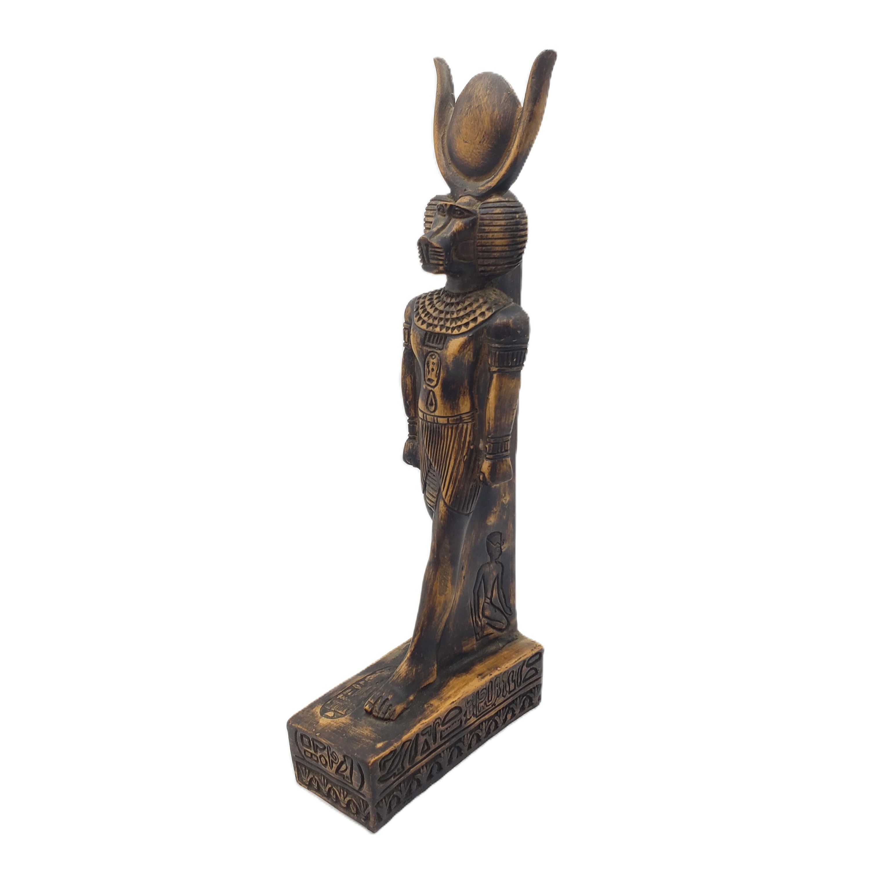 Decorative statue with intricate designs on a white background