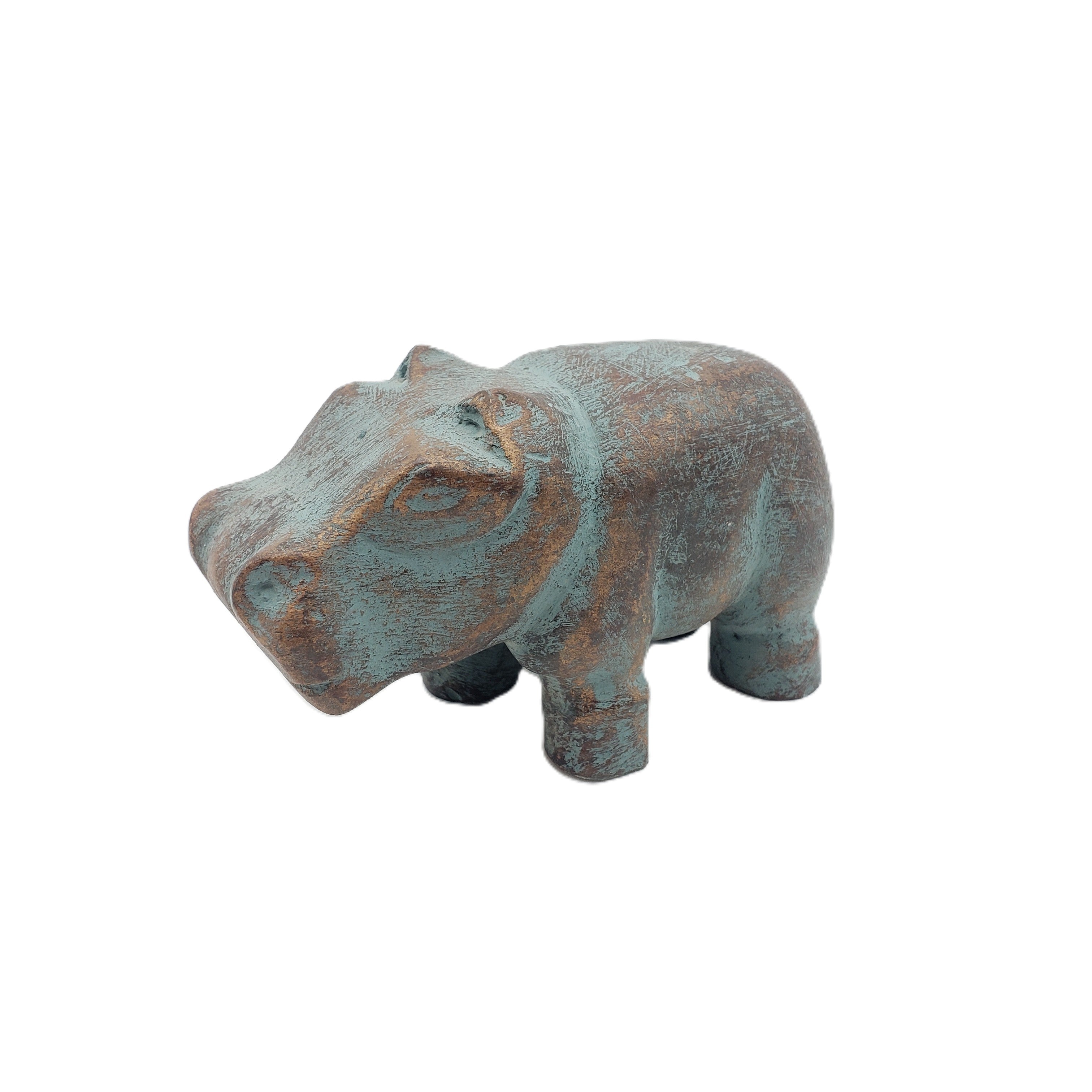 Bronze hippo figurine on a white background