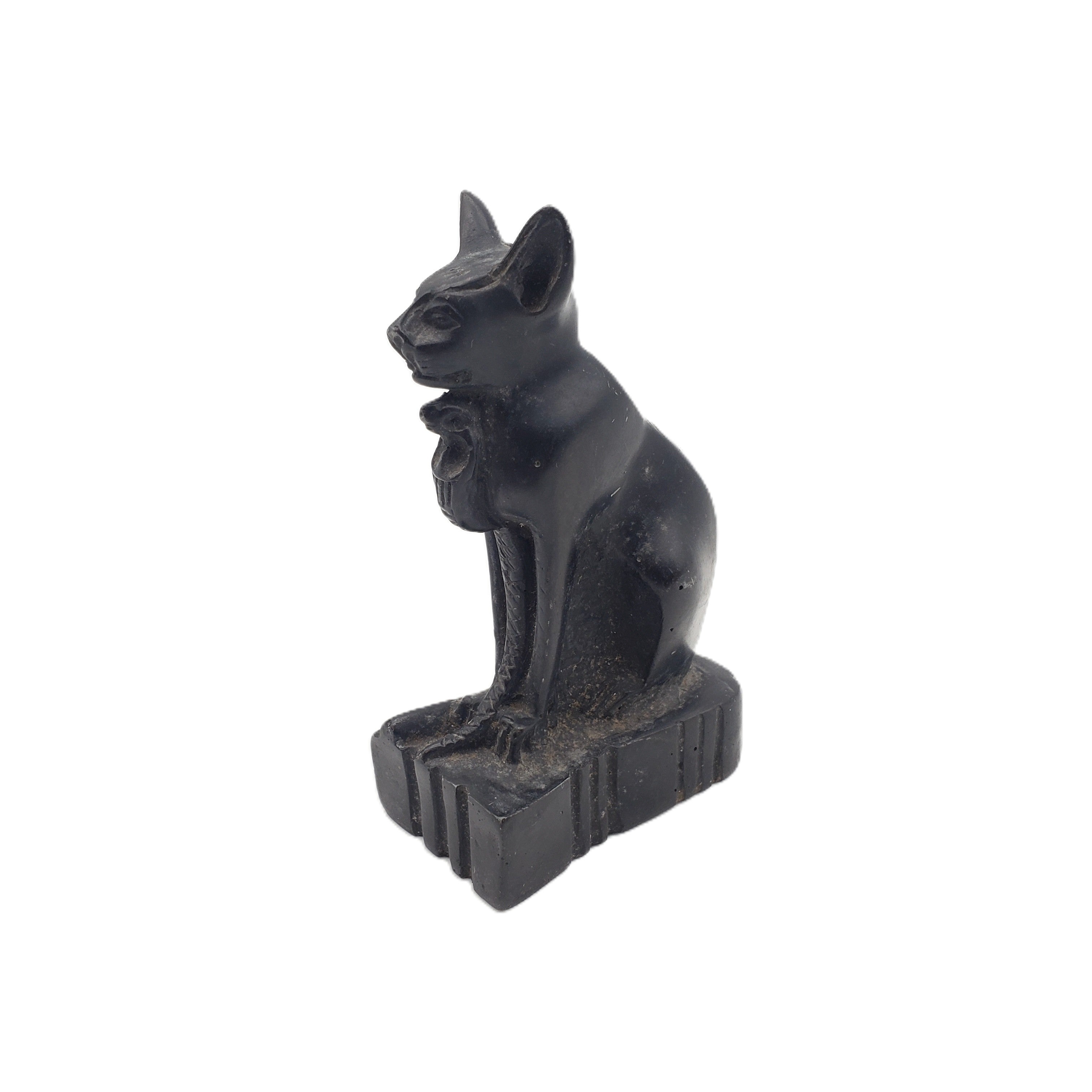 Black cat figurine on a white background