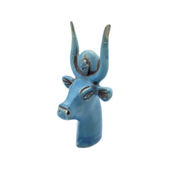 Blue ceramic bull head figurine on a white background