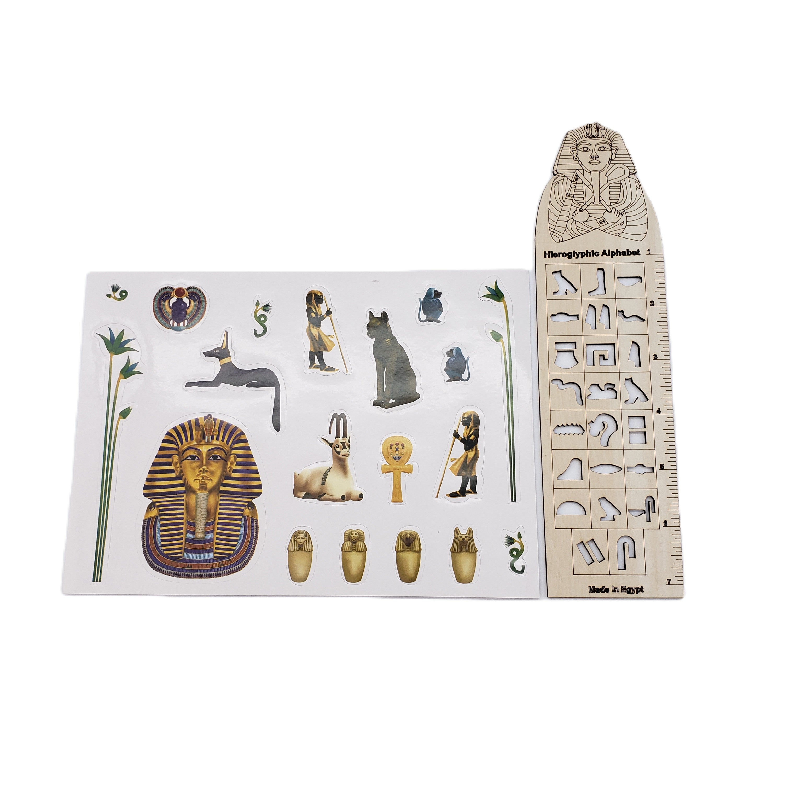 Egyptian-themed educational items including stickers and a ruler on a white background