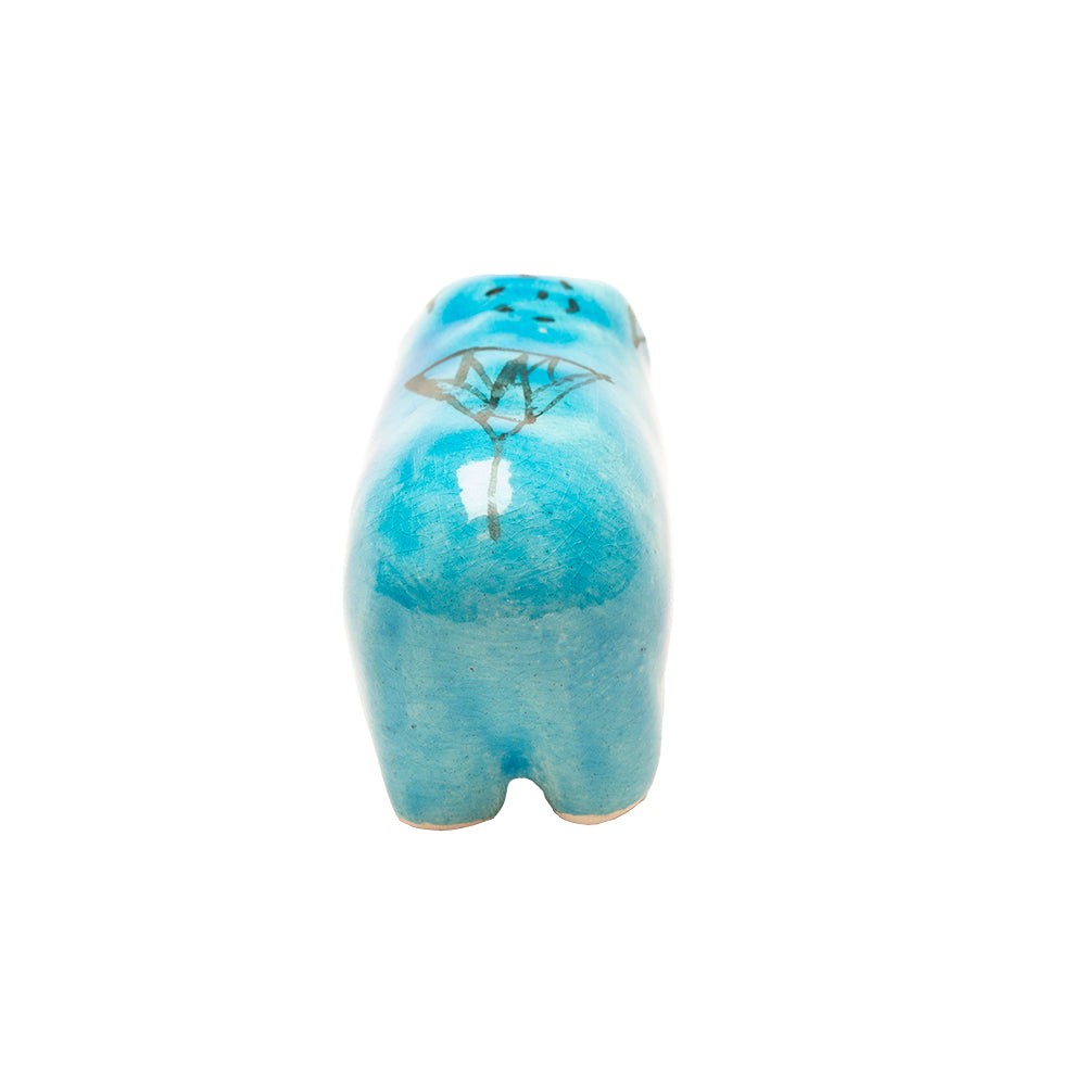 Turquoise ceramic hippo figurine on a white background