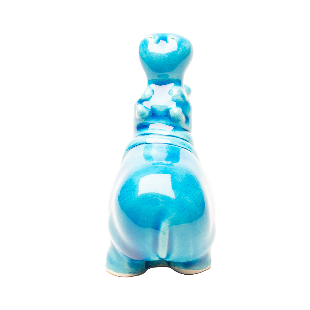 Blue ceramic hippo on a white background