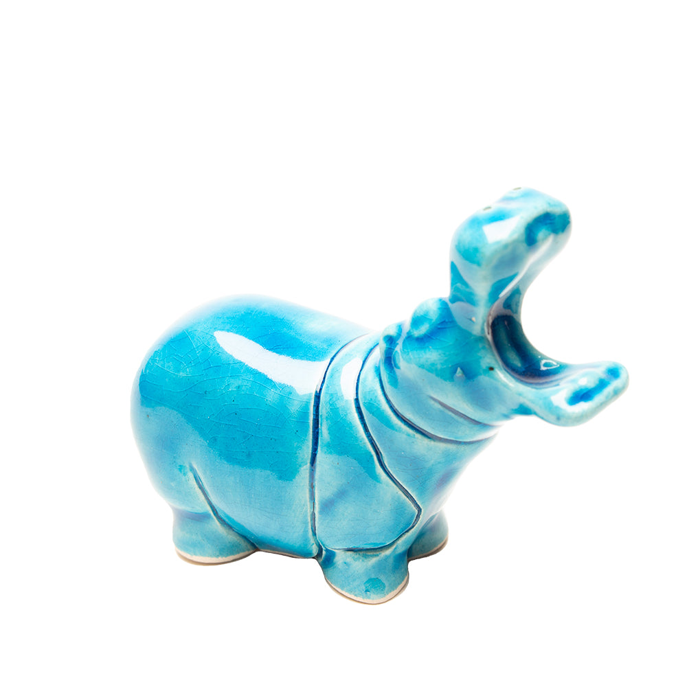 Blue ceramic hippo figurine on a white background