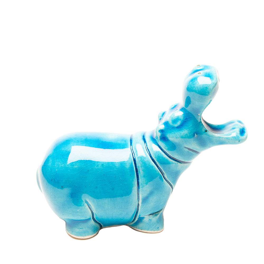 Blue ceramic hippo figurine on a white background