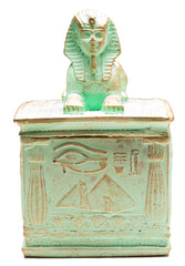 Decorative box with Egyptian sphinx design on a white background