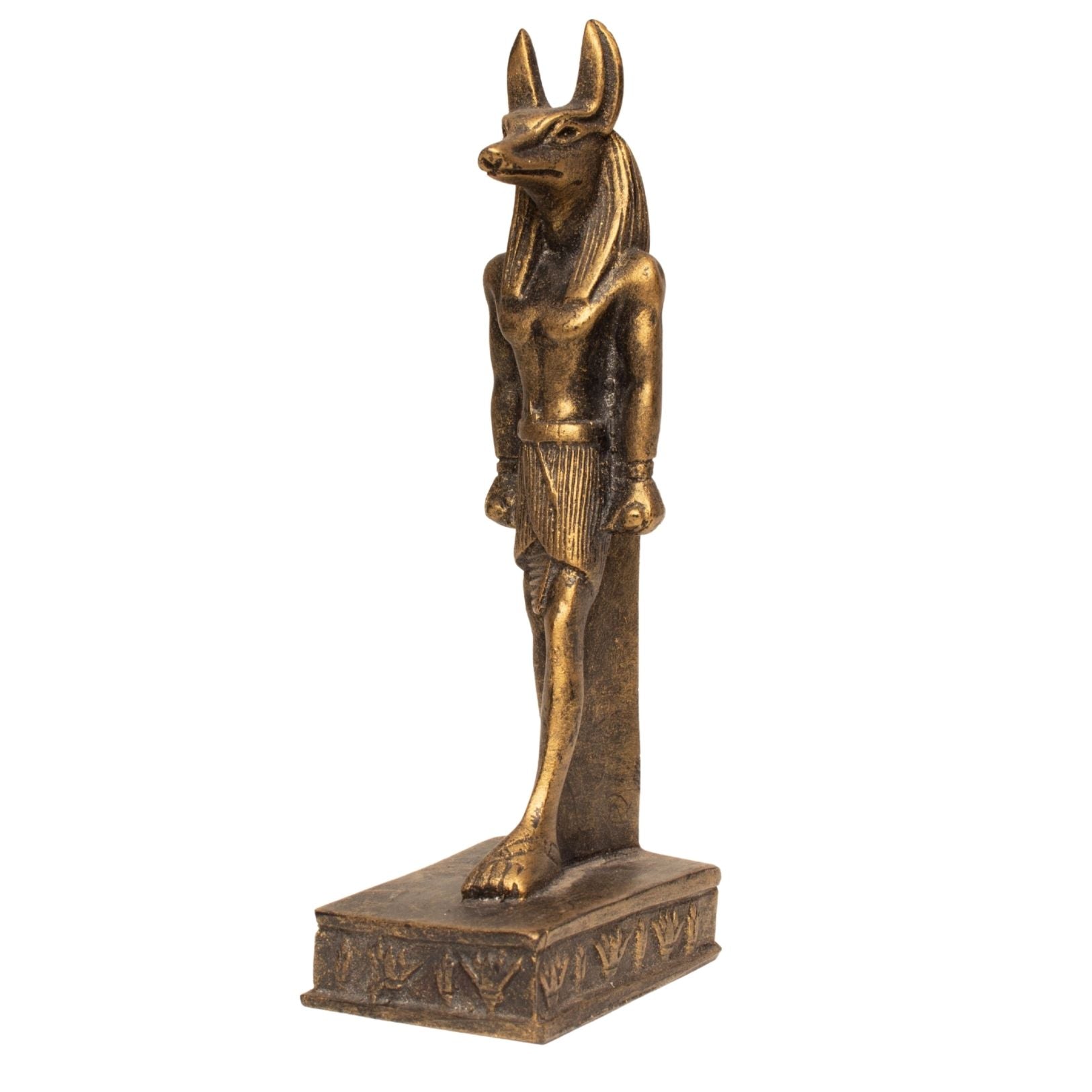 An ancient Egyptian Anubis statue with a golden-brown metallic finish, standing on a rectangular base with hieroglyphic details, isolated on a white background.