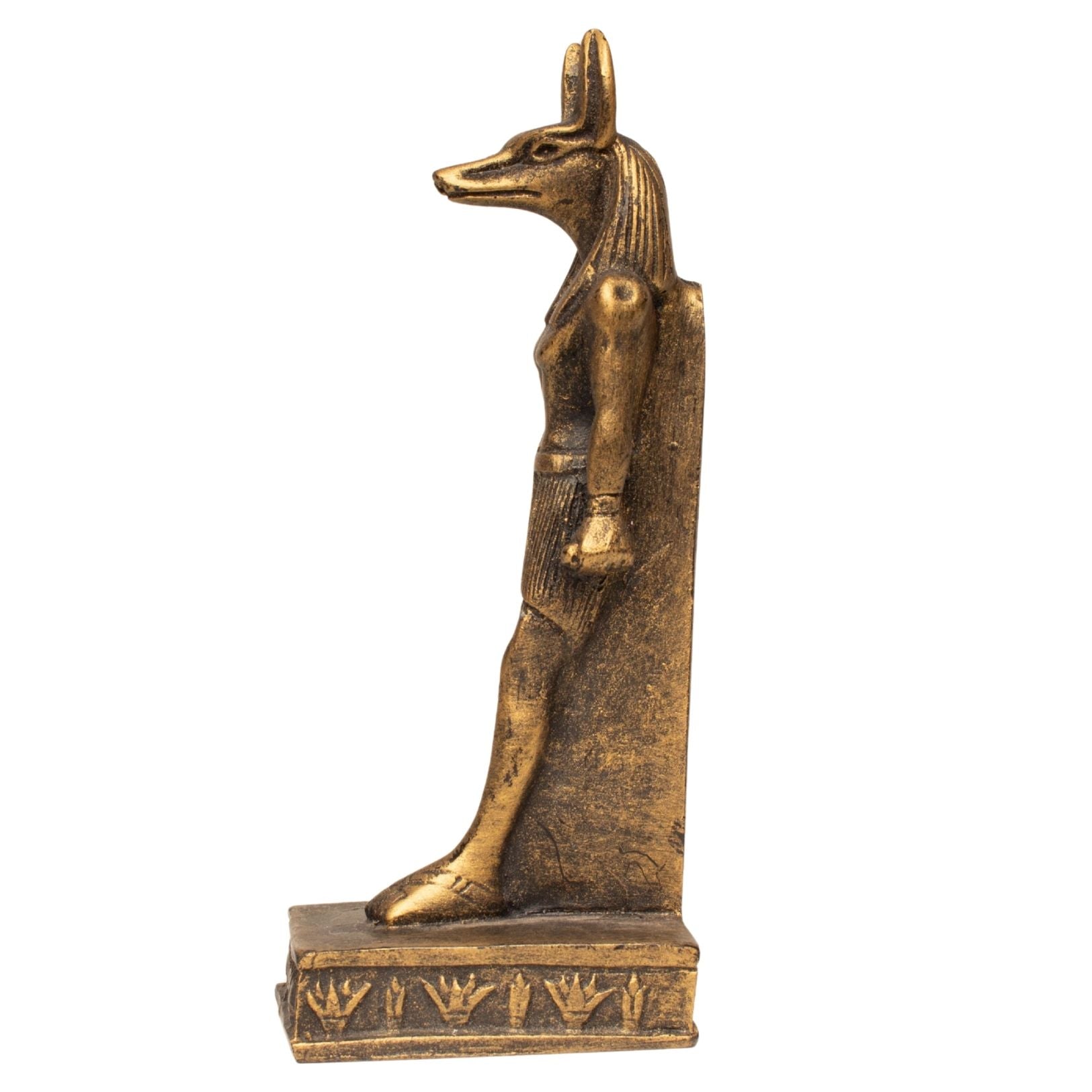 An ancient Egyptian Anubis statue with a gold finish, standing on a rectangular pedestal base against a plain white background.