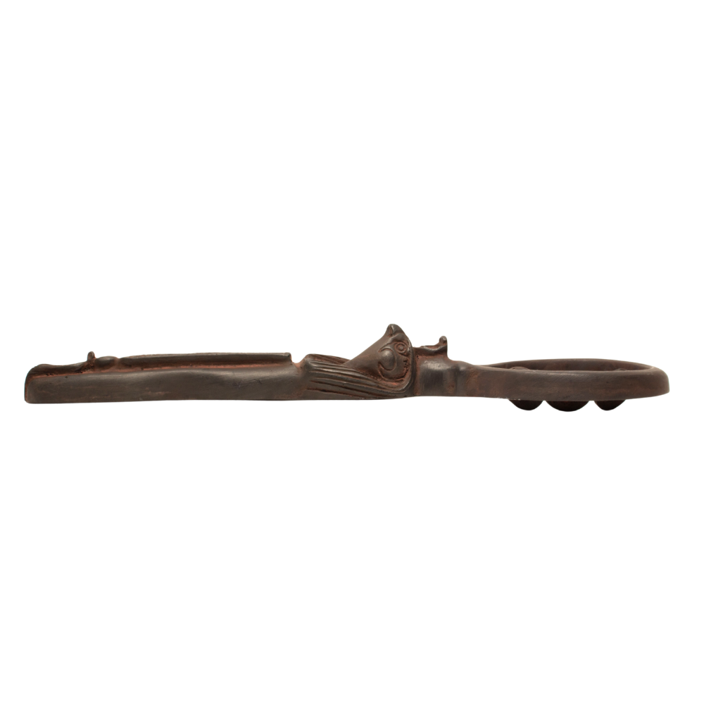 A dark brown carved Egyptian sistrum rattle with a stylized animal head detail near the center, shown horizontally against a plain white background.
