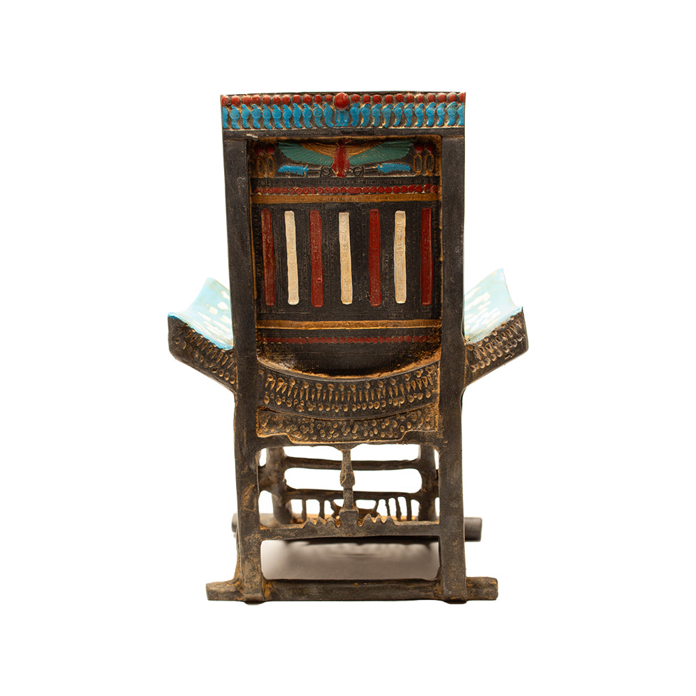 Decorative chair with a colorful backrest on a white background