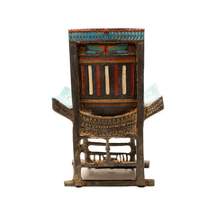 Decorative chair with a colorful backrest on a white background