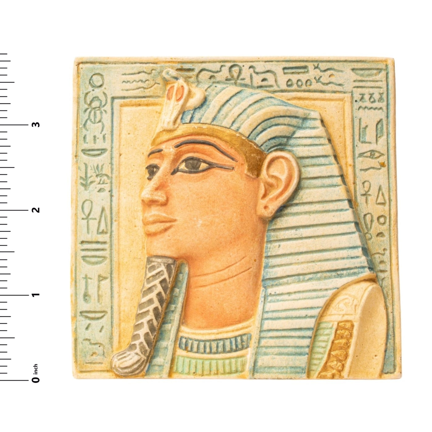 Decorative tile with an Egyptian pharaoh design on a white background