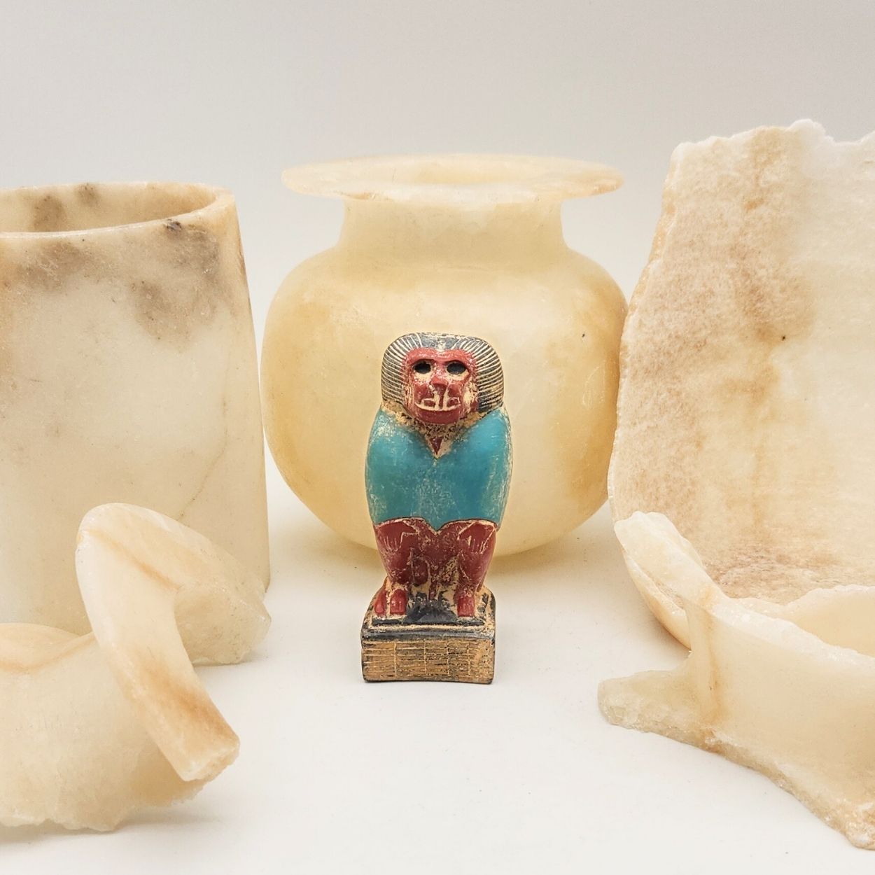 Decorative item of a baboon on a white background