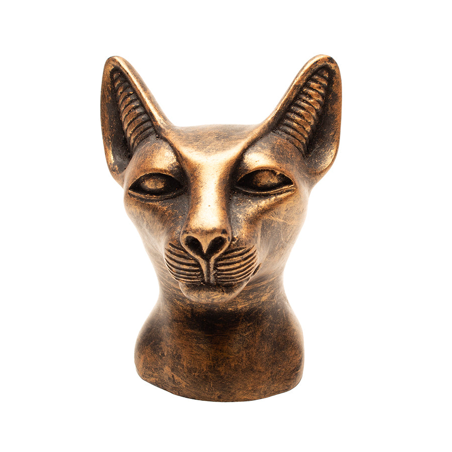 Bronze cat head sculpture on a white background