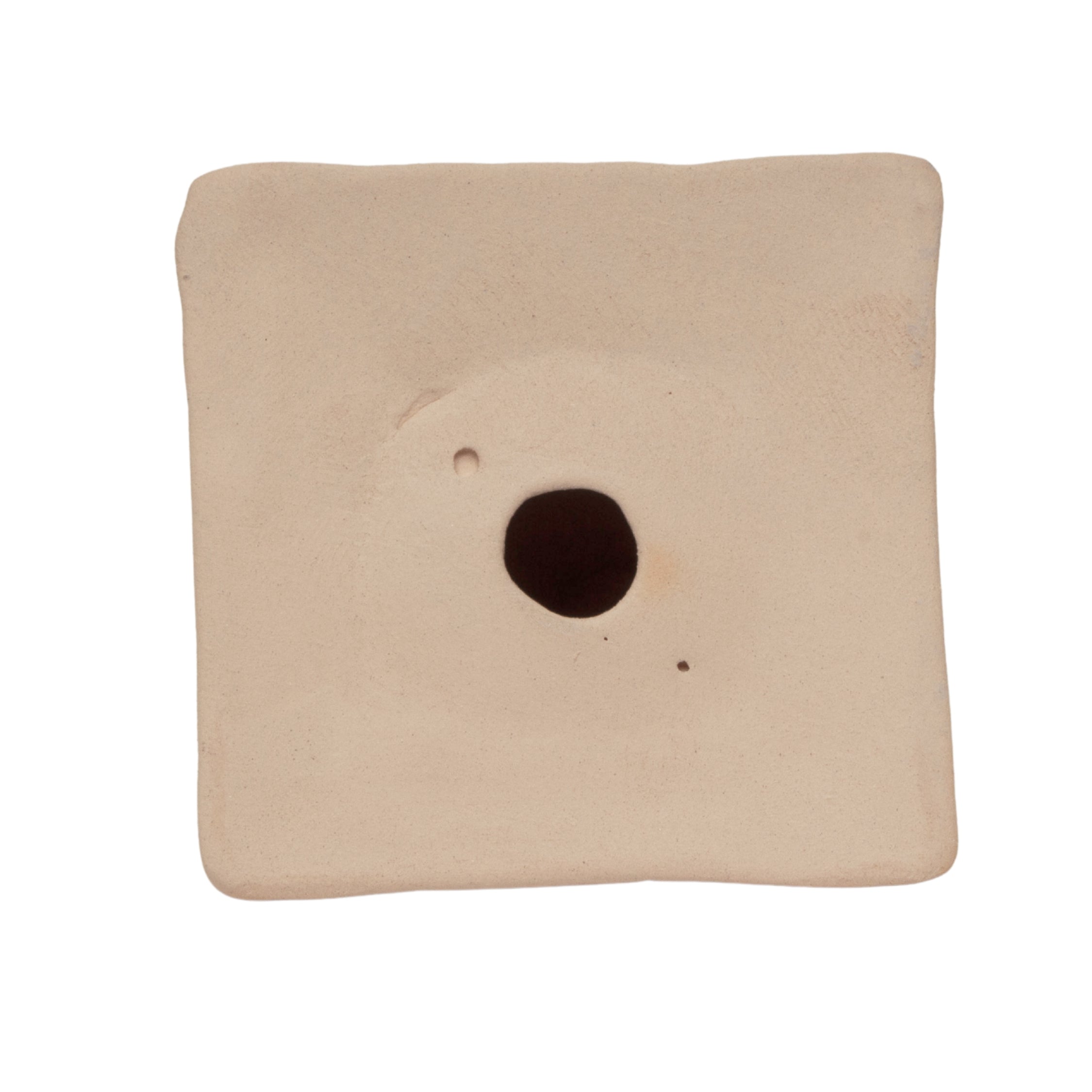 A square beige ceramic bottom of statue with rounded corners and a central circular hole, shown on a plain white background.