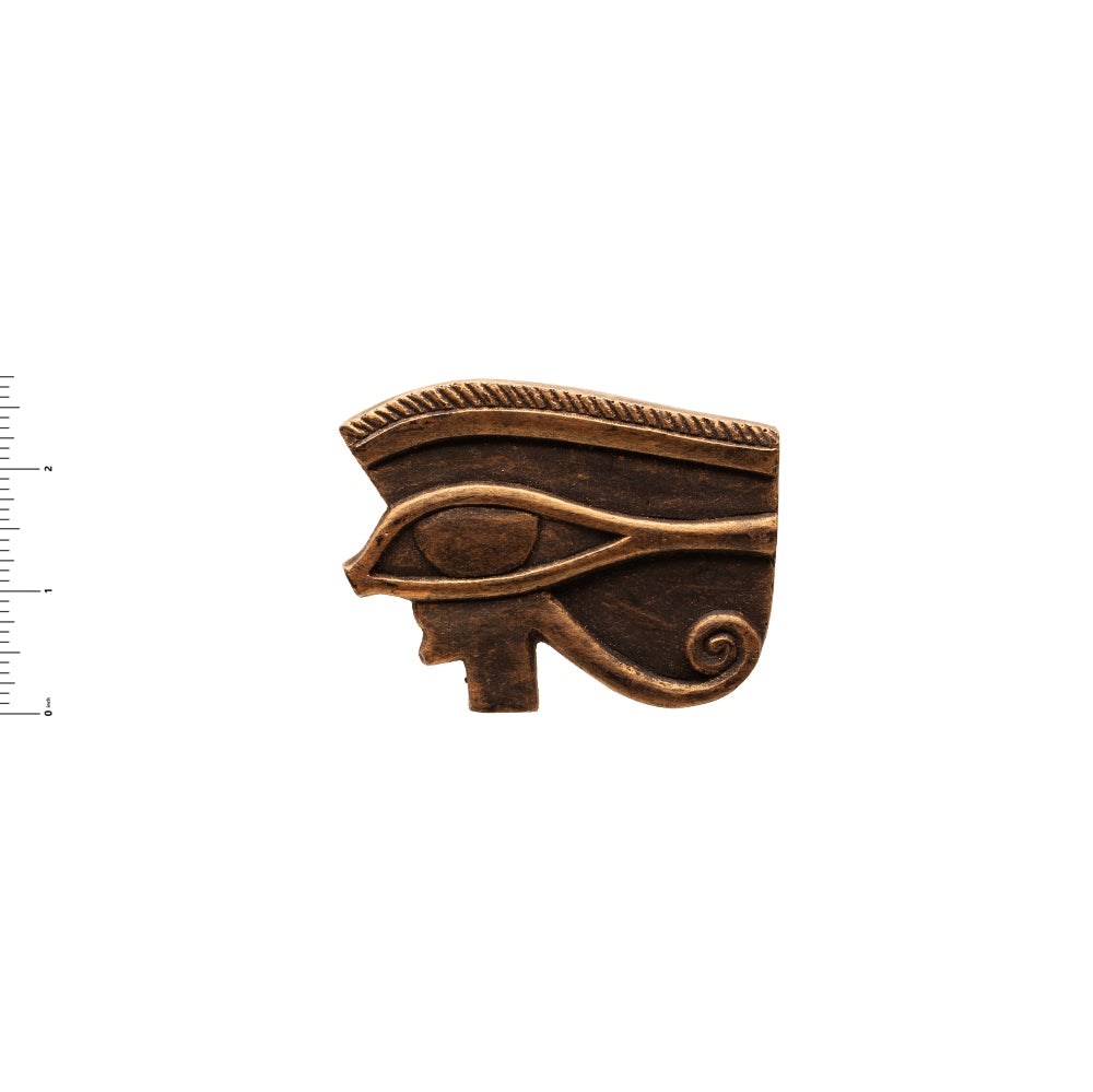 Bronze eye of Horus symbol on a white background