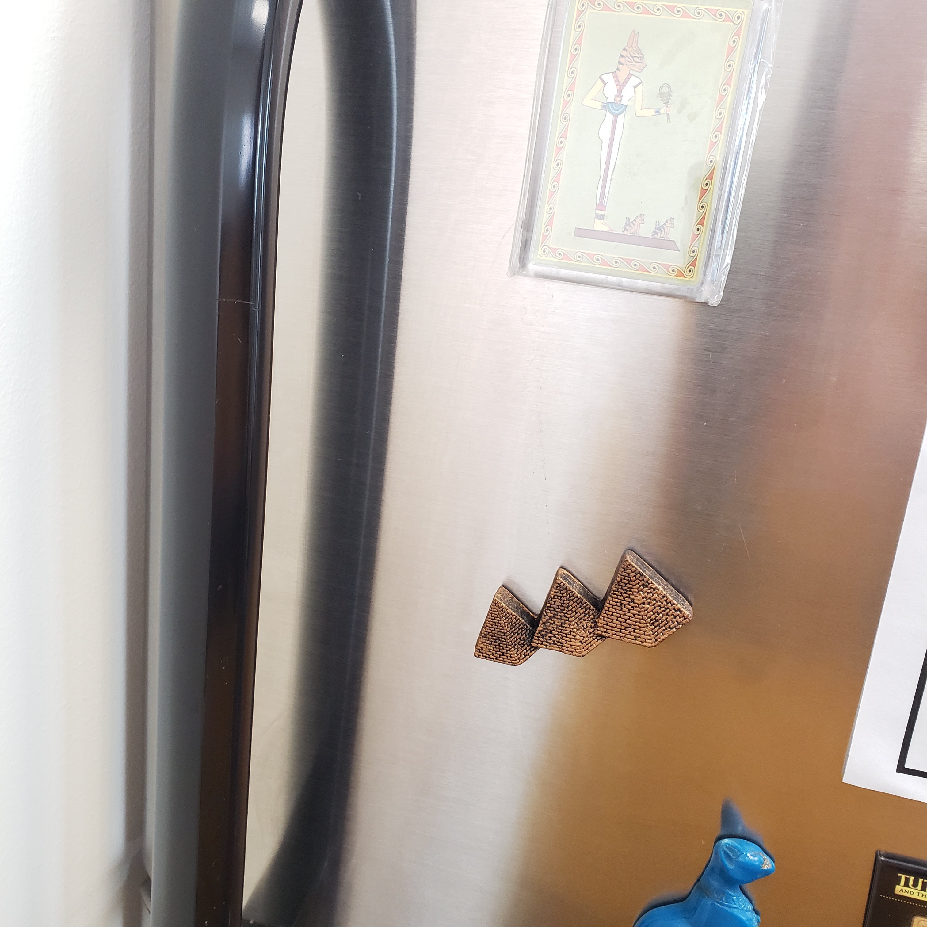 Decorative item on a metallic surface with a blurred background