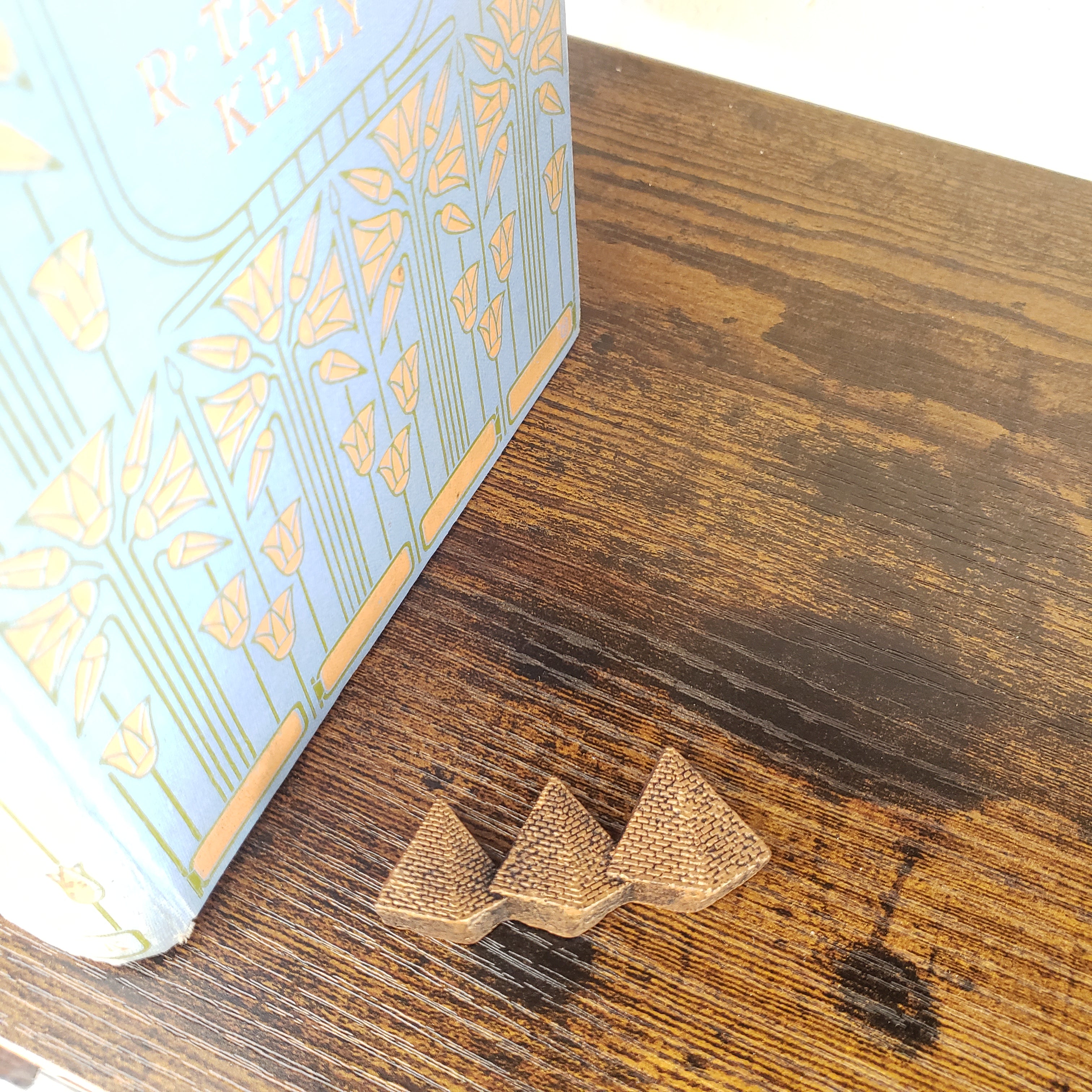 Pyramid magnet with on a wooden surface