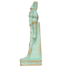 An Egyptian-style standing pharaoh figurine with a distressed turquoise and beige patina finish, shown against a plain white background.